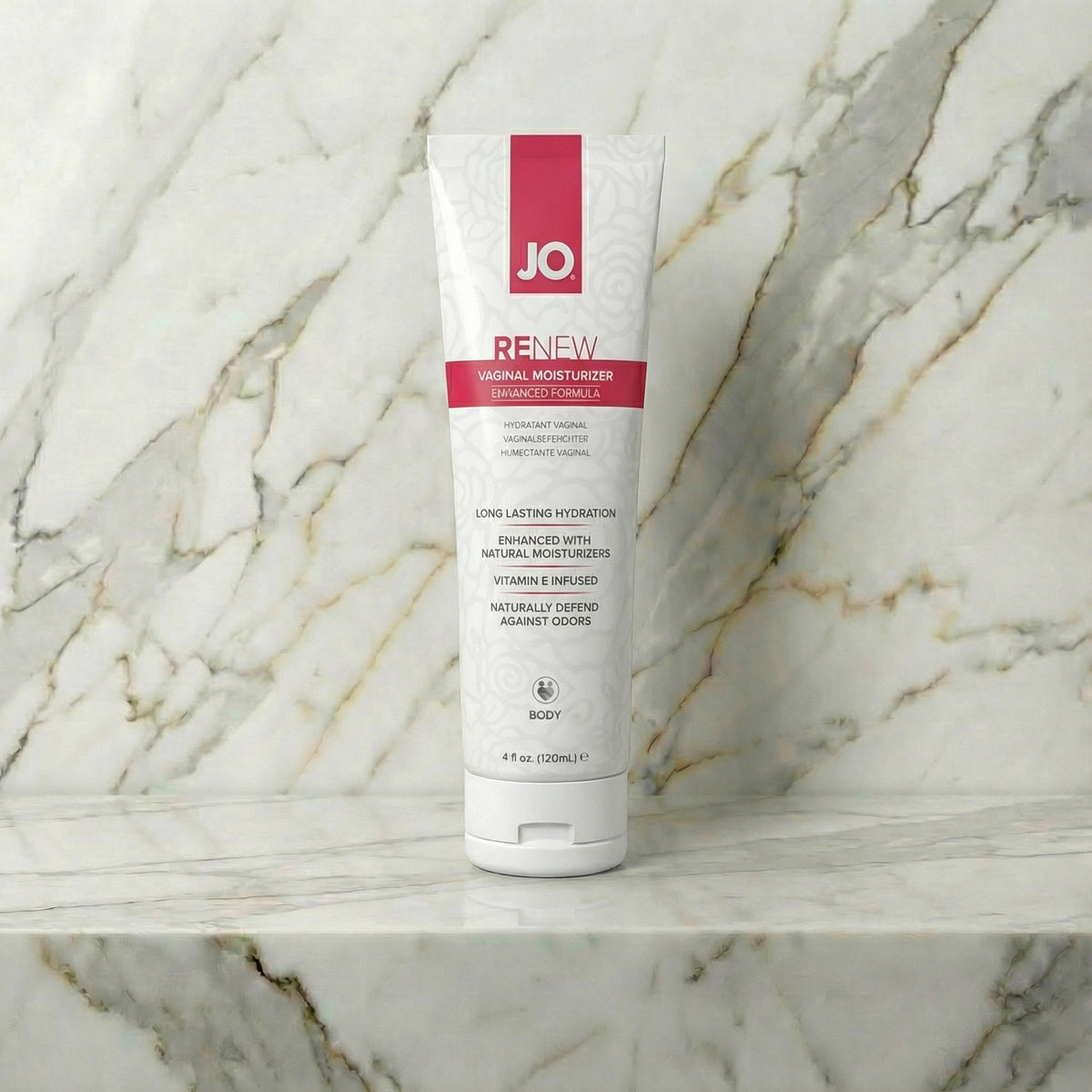 Tube JO Renew vaginale moisturizer van 120 ml rechtop op een marmeren plank