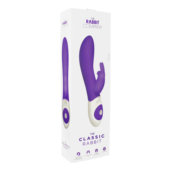 The Classic Rabbit vibrator van The Rabbit Company in paars naast witte productverpakking