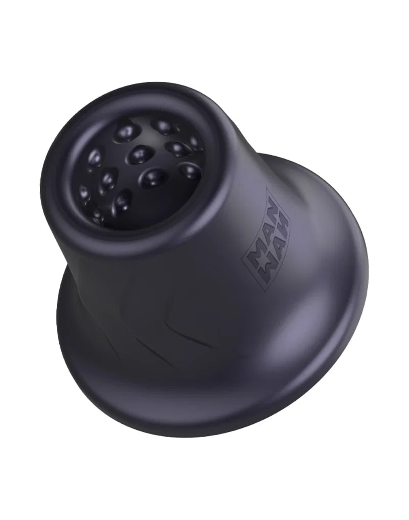 Man.Wand opzetstuk met noppen in zwart siliconen, close-up bovenaanzicht van wand-accessoire