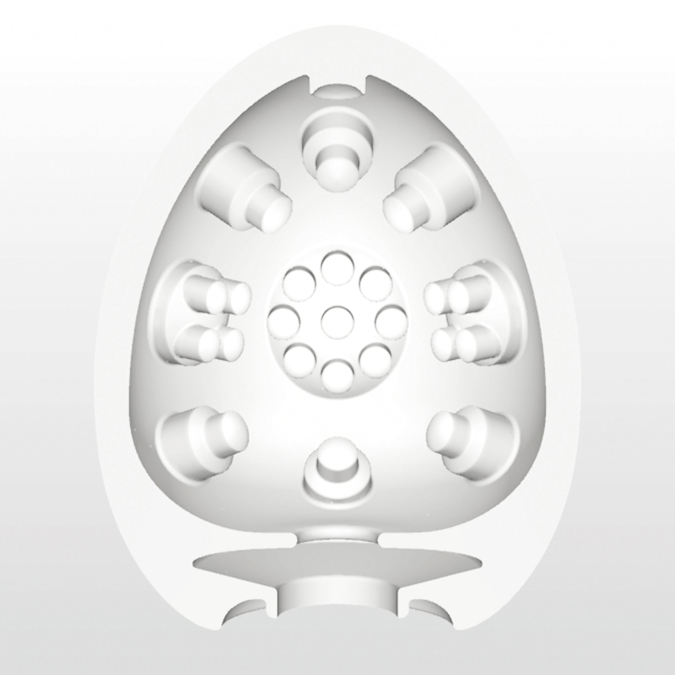 Doorsnede van de Tenga Egg Clicker met interne structuur van ronde nokjes en gaatjes