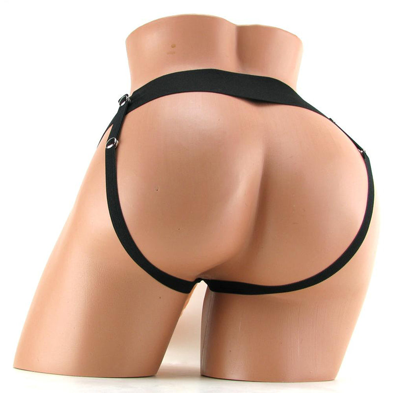 Achterkant van het zwarte harnas van de holle strap-on om een paspop