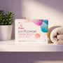 Sfeerbeeld: doosje Beppy Soft Comfort Dry tampons op een badkamerplank naast een handdoek