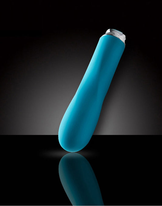 Stijlvol gepositioneerde Foxy vibrator in sfeervolle omgeving met zachte verlichting