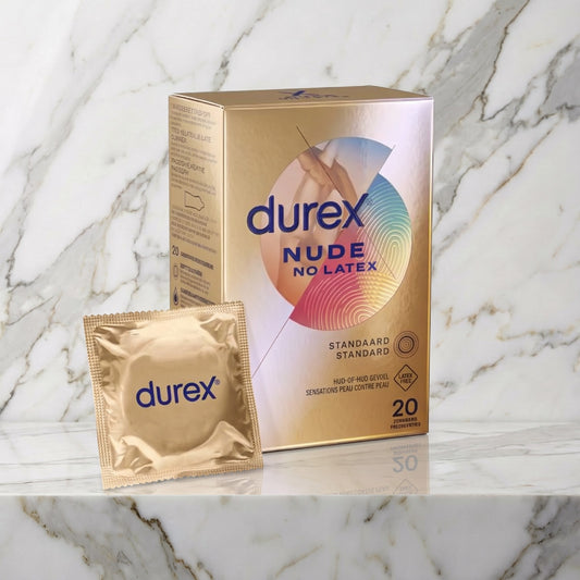 Gouden doos en condoomzakje op een marmeren plank, Durex Nude No Latex 20 stuks van Durex