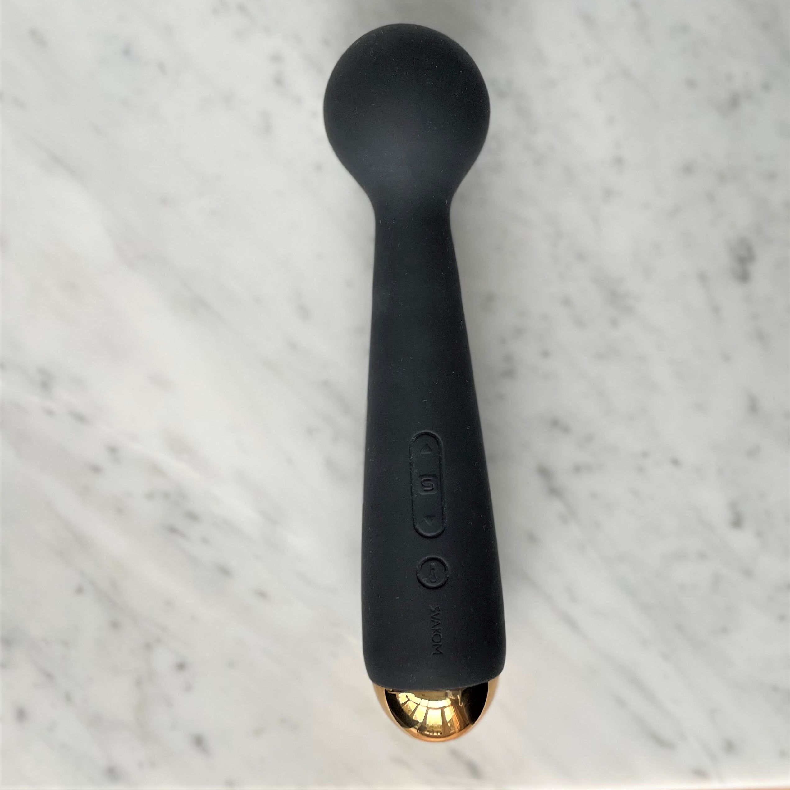 Emma Neo Wand vibrator bovenaanzicht met bedieningsknoppen en ronde wandkop