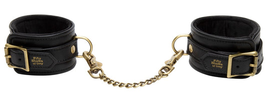 Enkelboeien van Fifty Shades of Grey verbonden met gouden ketting, luxe uitstraling