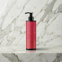 Body Gliss massage olie met rozenblaadjes in transparante fles van 150ml op witte achtergrond