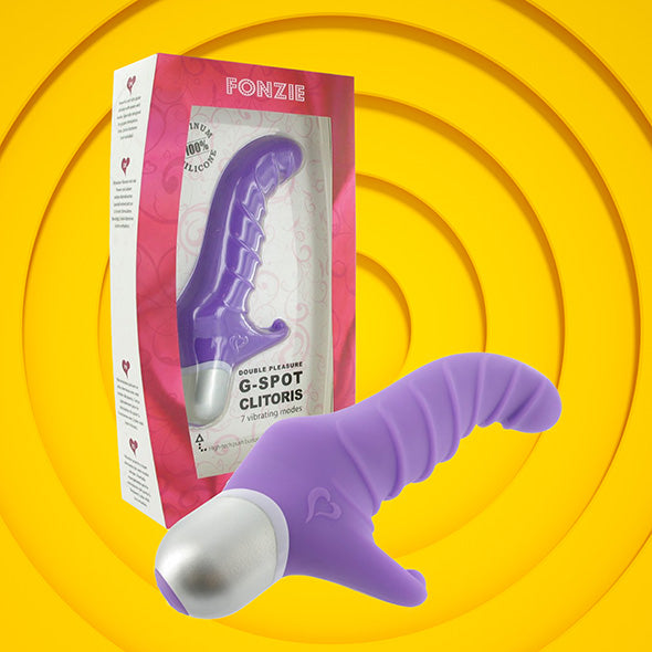 Fonzie G-spot en clitorisvibrator in paars siliconen naast roze verpakking