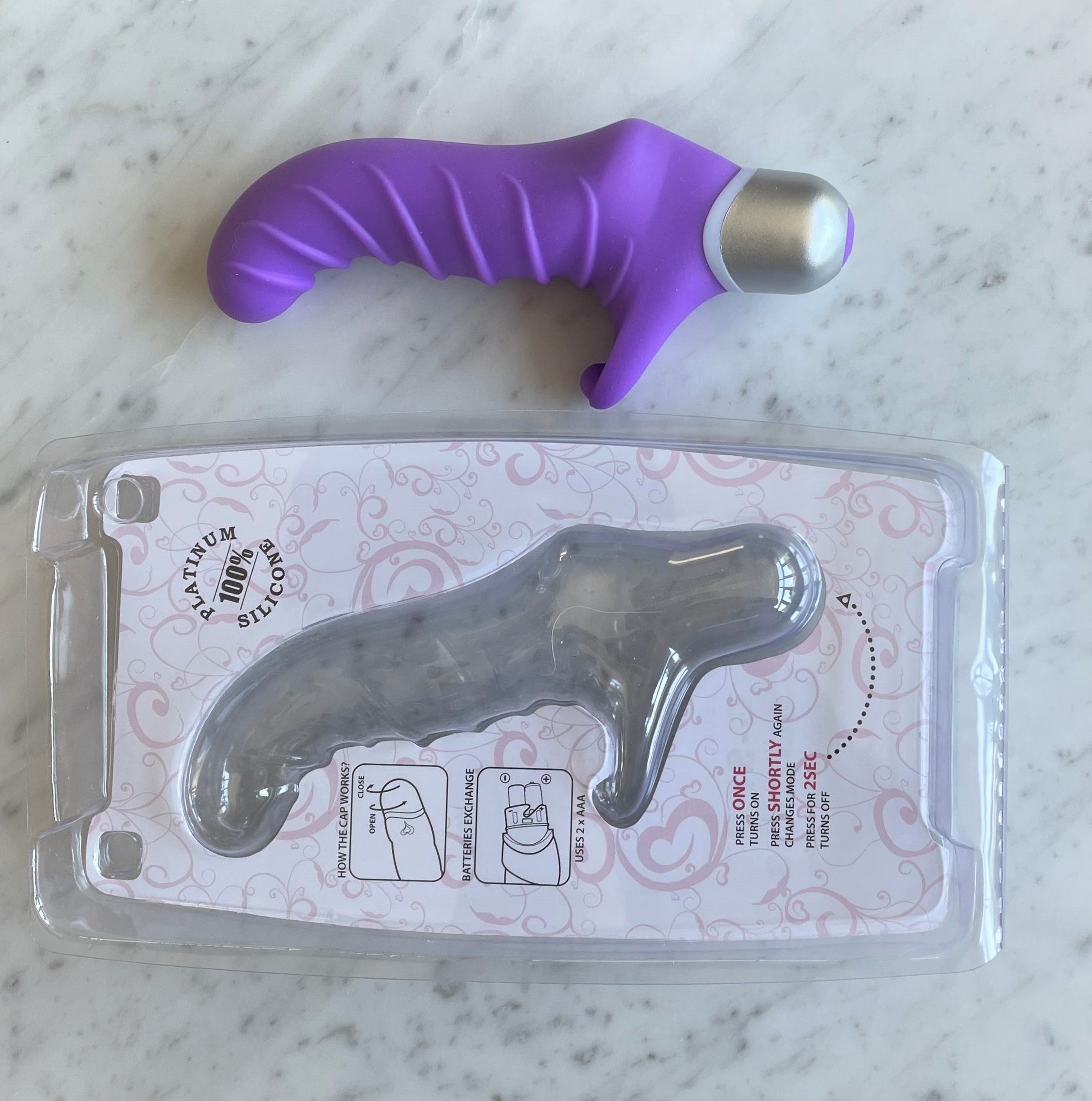 Fonzie vibrator met geopende verpakking, batterij-informatie en gebruiksinstructies