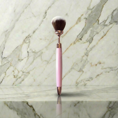 Roze kwast met rosegouden details rechtop op een marmeren plank, Vibrerende Brush Softy