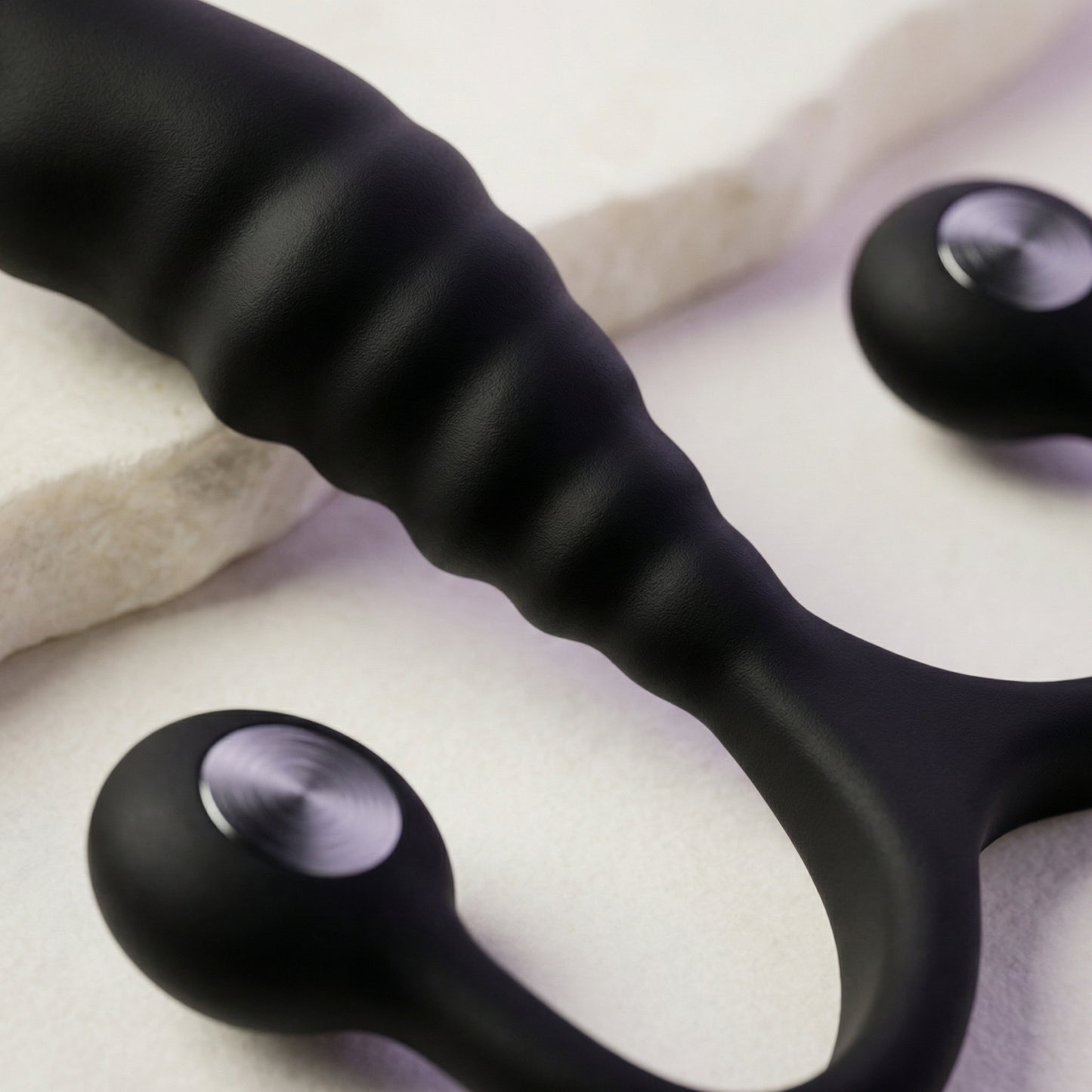 Close-up detail van de PSY stimulator materiaal en afwerking, medisch veilig siliconen oppervlak