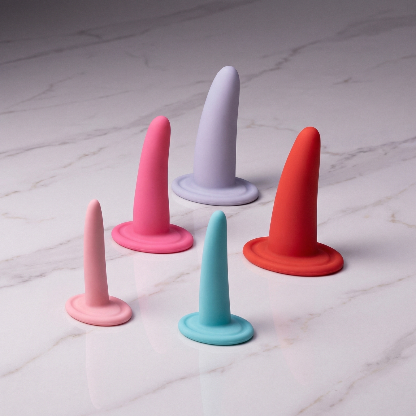 Set van 5 siliconen vaginale dilatatoren in oplopende maten, kleuren roze turquoise lila en rood