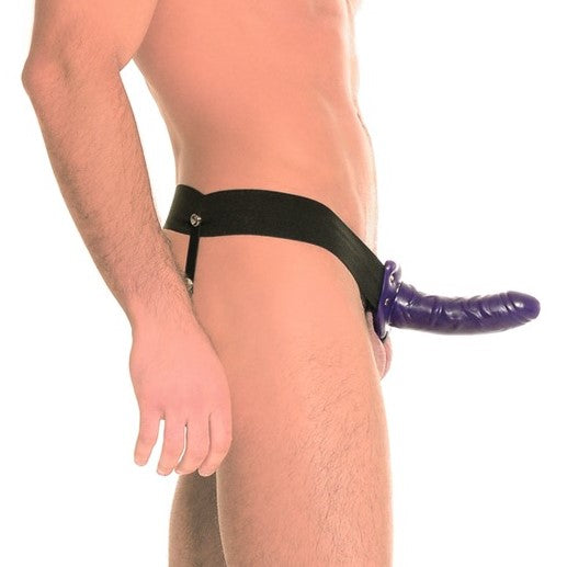 Paarse holle strap-on S/M gedragen door man met zwart harnas zijaanzicht