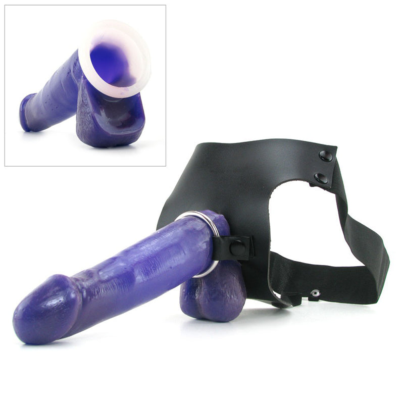 Losse paarse holle strap-on met metalen ring en zwart harnas, inzet toont de holle opening