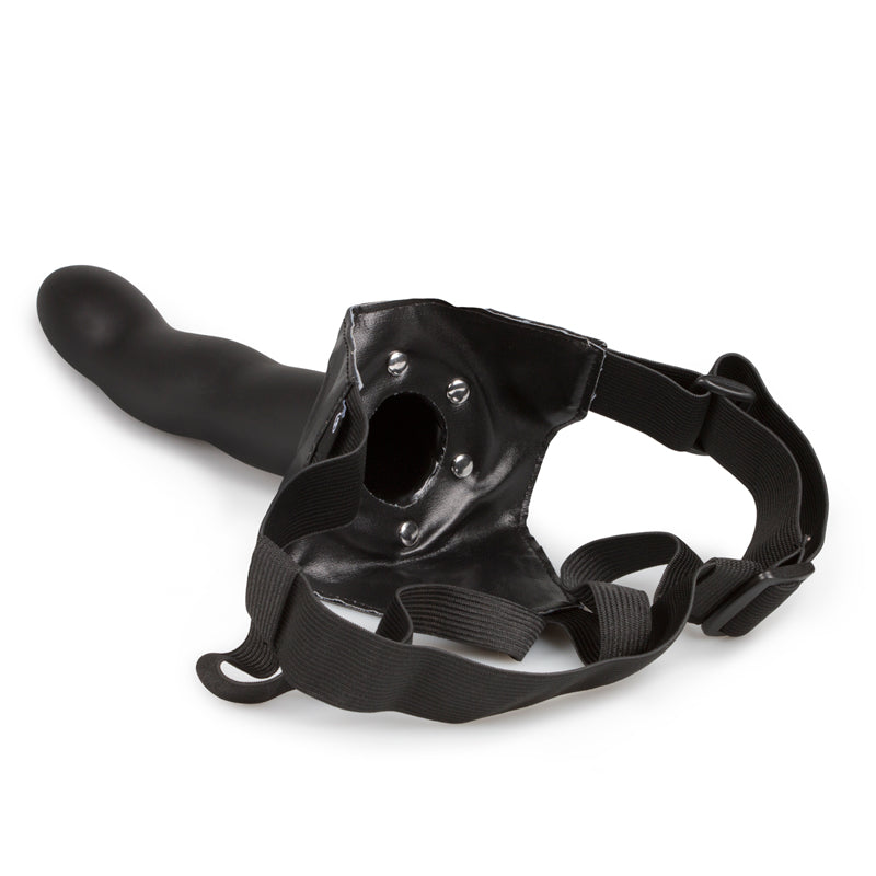 Achterkant van het voorstuk met de opening van de holle dildo en de banden