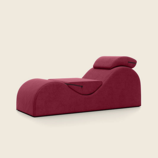 Liberator Esse Lounger in rood met verstelbare hoofdsteun en halfrond kussen, zijaanzicht