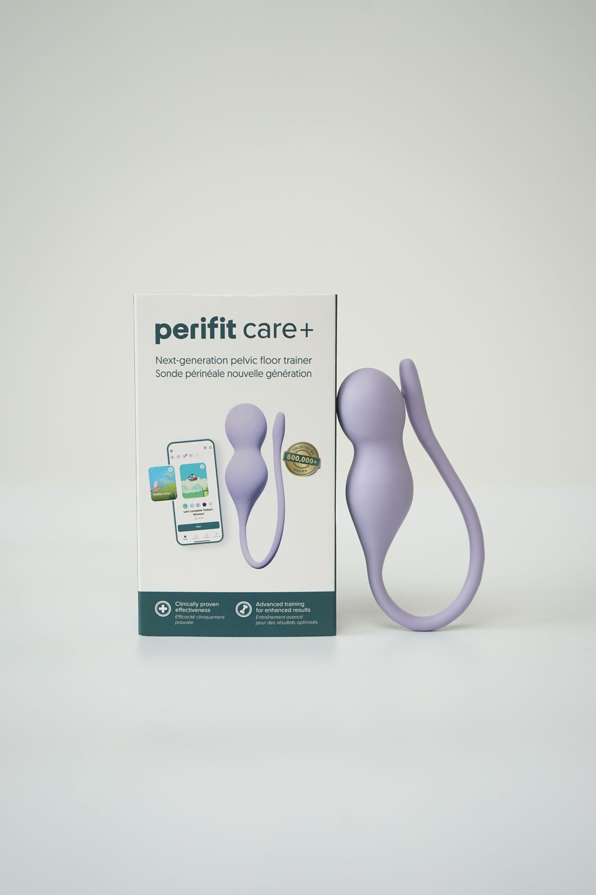 Doos van de Perifit Care+ met de lila bekkenbodemtrainer ernaast