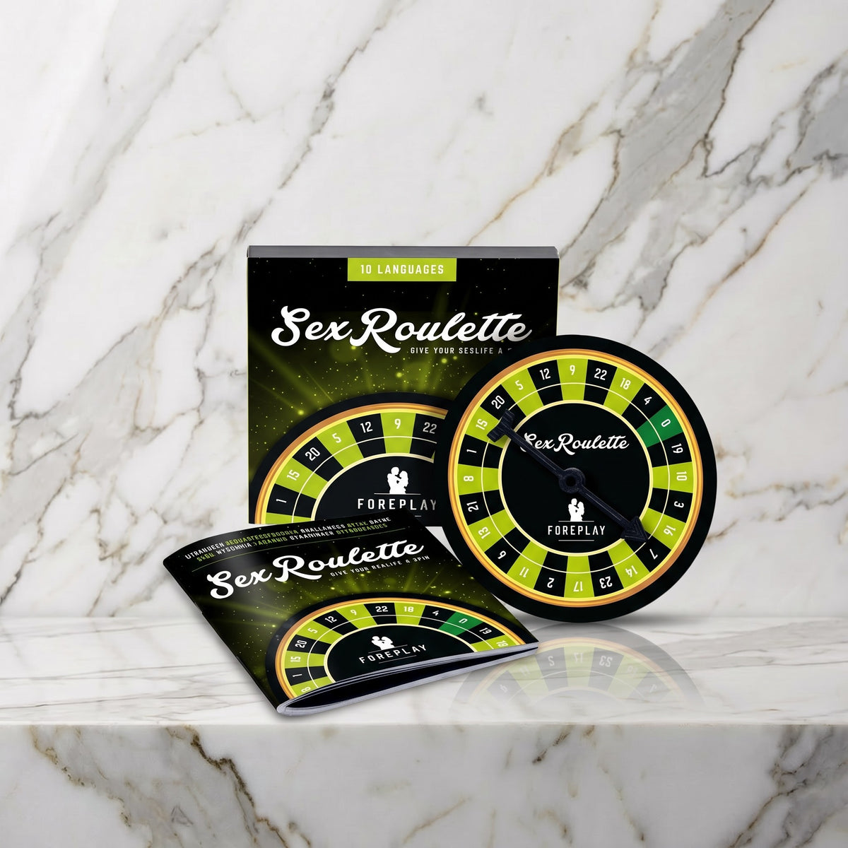 Doos, groen draaibord en boekje op een marmeren plank, Sex Roulette Foreplay van Tease & Please