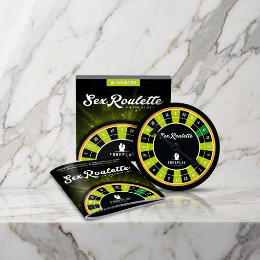 Doos, groen draaibord en boekje op een marmeren plank, Sex Roulette Foreplay van Tease & Please