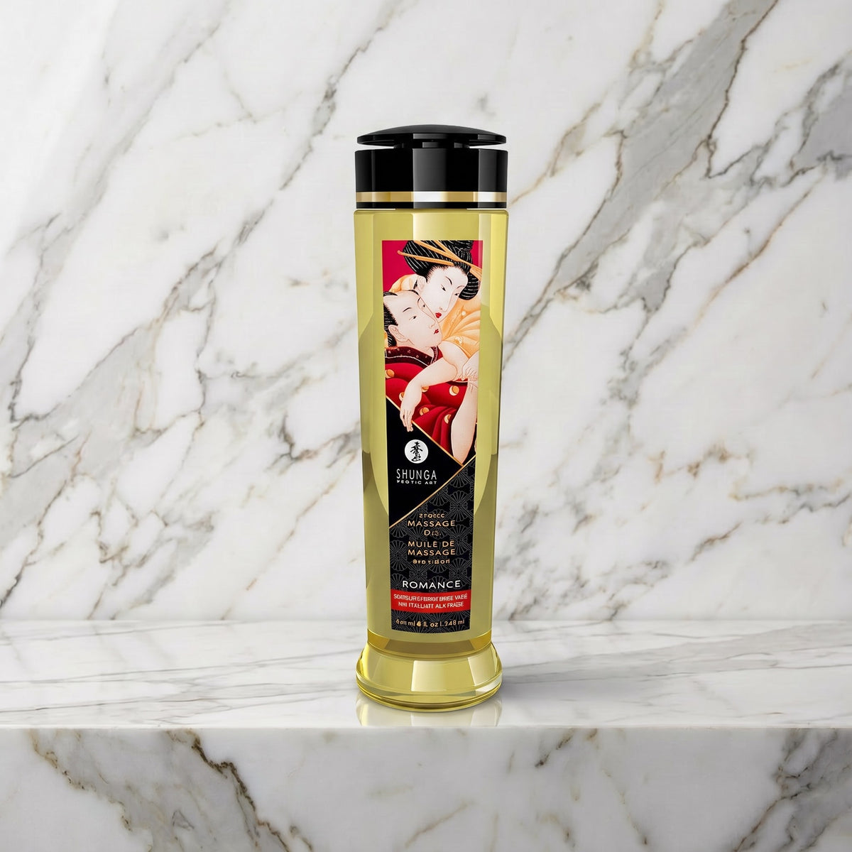 Fles Shunga Romance massageolie op een marmeren plank, 240 ml