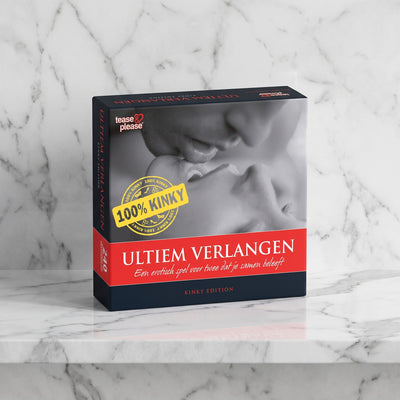 Doos van het erotische spel Ultiem Verlangen 100% Kinky op een marmeren plank