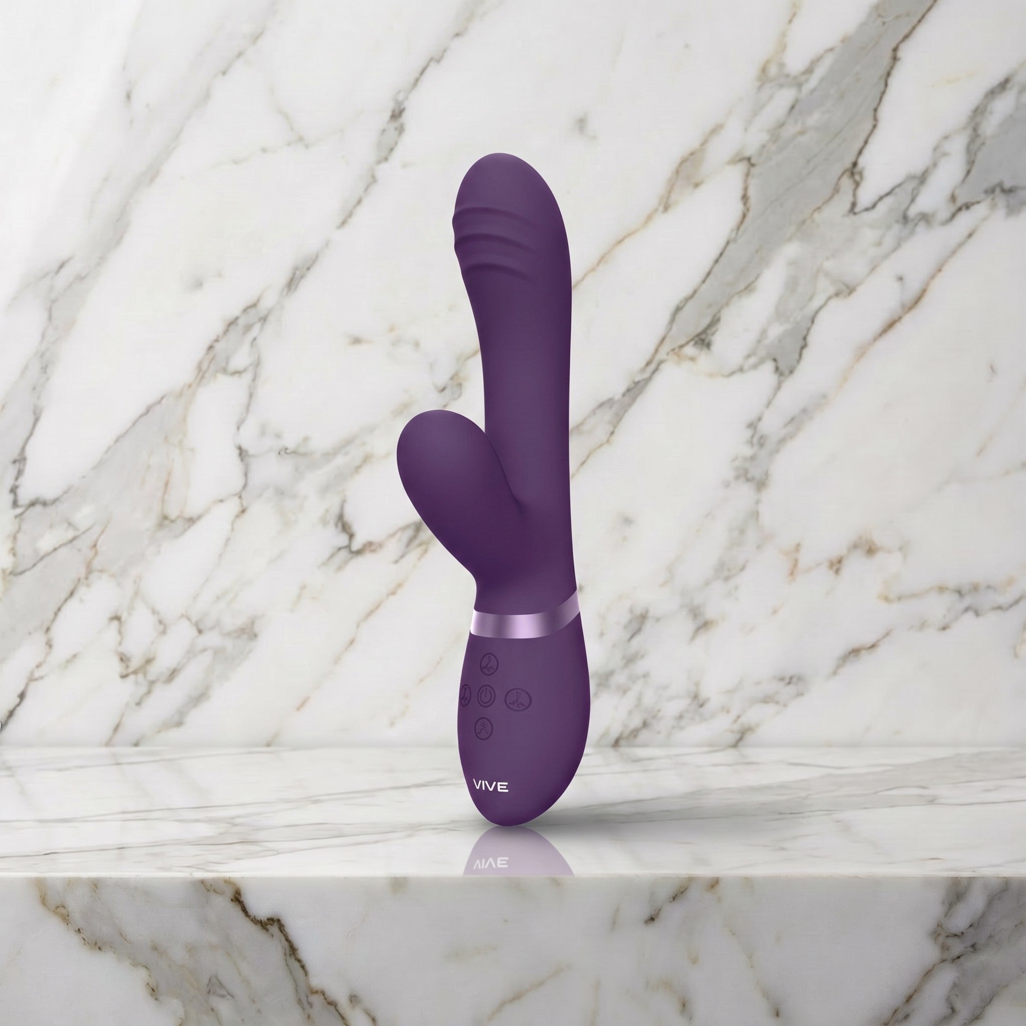 Paarse Vive Tani rabbit vibrator rechtop op een marmeren plank, van Vive