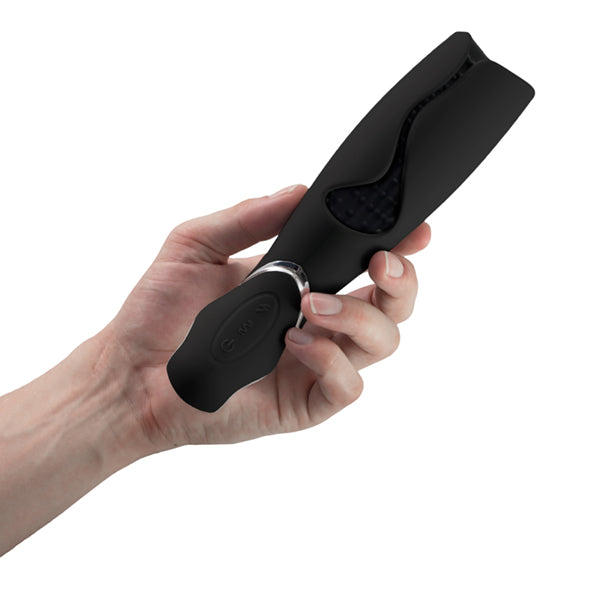 Vulcan Masturbator in hand, toont compact formaat en eenhandige bediening