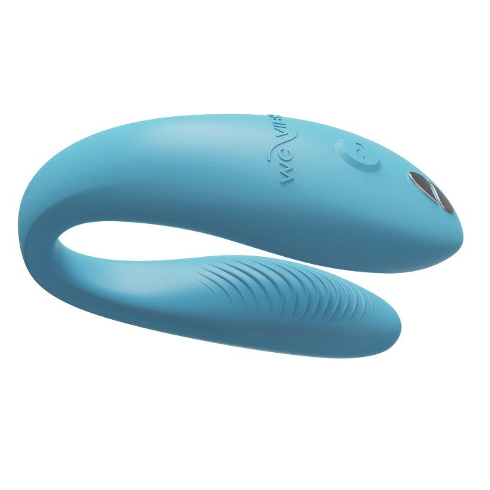 We-Vibe Sync Go verpakking met paarse vibrator en USB-oplaadkabel