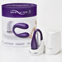 We-Vibe 3 in paars-witte cilindrische verpakking met vibrator en accessoires