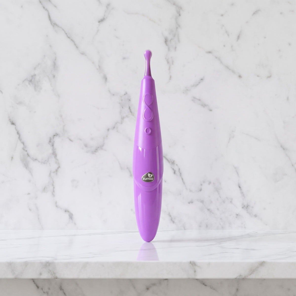 Lila Zumio S clitorisvibrator met dun steeltje en bolletje rechtop op een marmeren plank